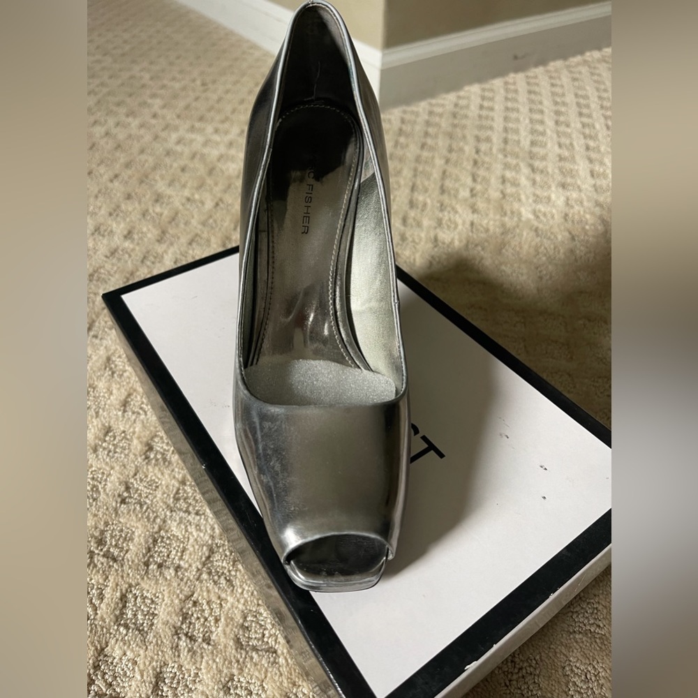 Ladies Marc Fisher peep toe pumps.